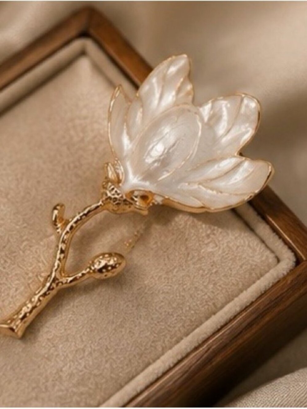 Magnolia Pearl Botanical Brooch with Sculptural Gold Stem